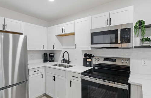 Haltom City Apartment | Modern 4BR 2BA Home with Hot Tub-Grill & Huge Yard