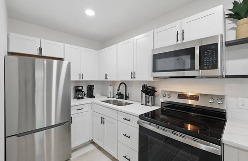 Haltom City Apartment | Modern 4BR 2BA Home with Hot Tub-Grill & Huge Yard