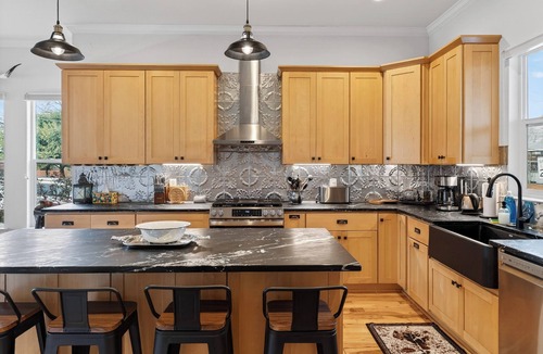 Austin House | Modern Home + Firepit + Balcony + Near East Austin | Chestnut Ember by AvantStay
