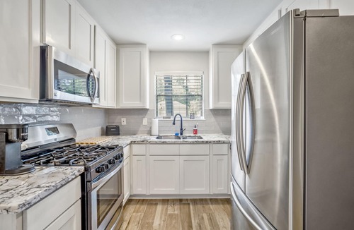 Panther Creek House | Music inspired Modern stay in The Woodlands.