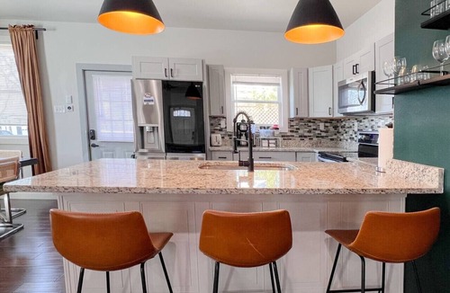 Near East Side House | Near Downtown, 2 King Bed, Gated Parking (Monthly)