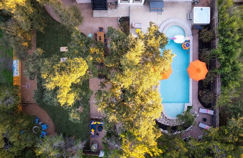 Apache Shores House | New Austin Luxe Retreat with Heated Pool+Arcade+Theater+Fire Pit