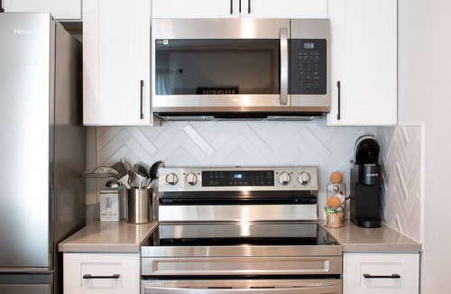 Barton Hills Condo | Newly Renovated Modern Condo- Walk to Zilker & Barton Springs! Private backyard!