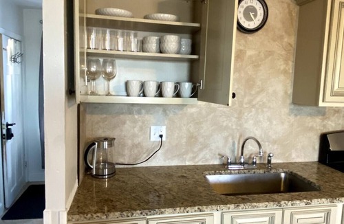 Gloucester Apartment | Open concept, 2-level apartment with scenic view