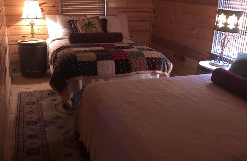 Hoyt Cabin | Private lakefront getaway with a sandy beach below the back deck!