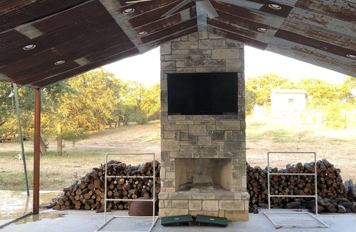 Harper Cabin | Private lodge in Harper, Tx w/Outdoor fireplace & covered patio Family friendly