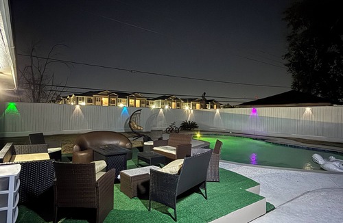 FM 1960 House | Private Luxury Poolside Guest Suite with Fire Pit & Modern Interior