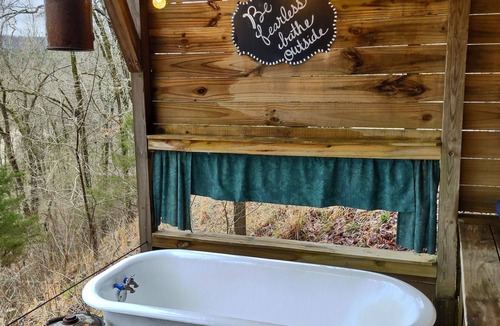 Caddo Gap RV Rental | Private River Tent Camping with Kayaks & Outdoor Bathhouse! Pet friendly!