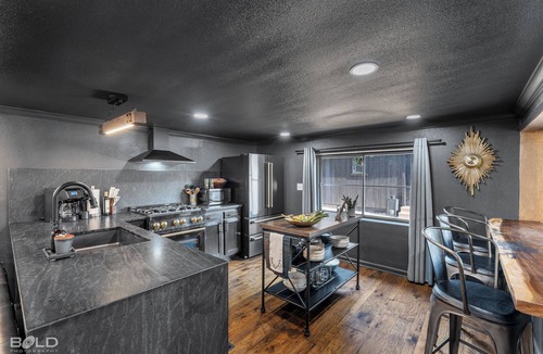 Jefferson Cabin | Relax and unwind at The Whiskey Barrel, a cozy waterfront retreat designed for fun and laid-back lake living. Soak in your private hot tub, paddle out with the kayaks, or spend the afternoon on one of the 4 decks reading a good book