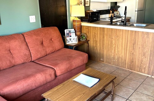 Uncertain Cabin | Relax and unwind with kayak access, covered outdoor living, a charcoal grill, and a short stroll to a charming café.