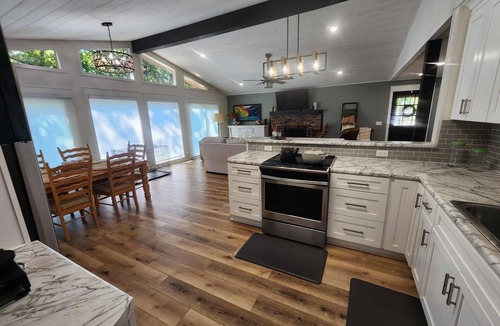 Eden Isle House | Relax & Recharge at The Nest – Lake Escape with Outdoor Fireplace & Hot Tub