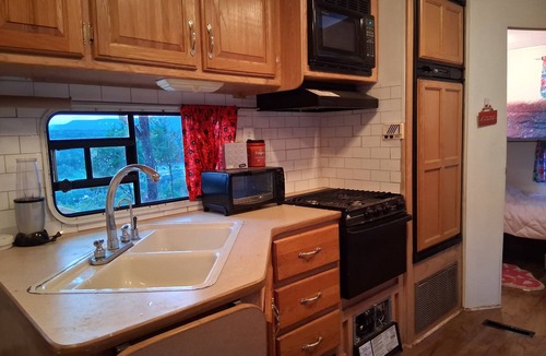 Gordon House | Secluded RV on mountain bluff on lake Palo Pinto, large deck. Bike,boat andswim.