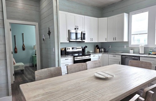Fulton House | Seven Palms Waterfront! Hot Tub, Arcade, Pool, Gas Grill. Walk to Pier & Pubs