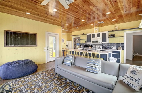 Port Aransas House | Situated on the stock pond at Ocean Village, adjacent to the neighborhood pool a