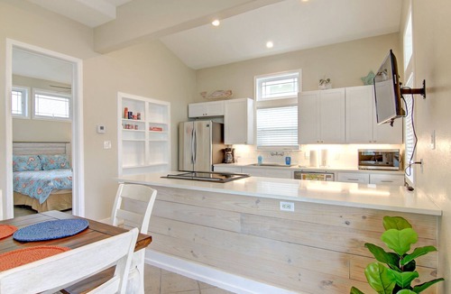 Sand Point House | Southern Comfort-in town, steps from heated pool, hot tub, beach boardwalk