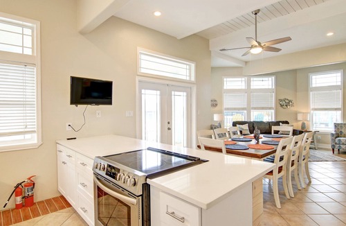 Sand Point House | Southern Comfort-in town, steps from heated pool, hot tub, beach boardwalk