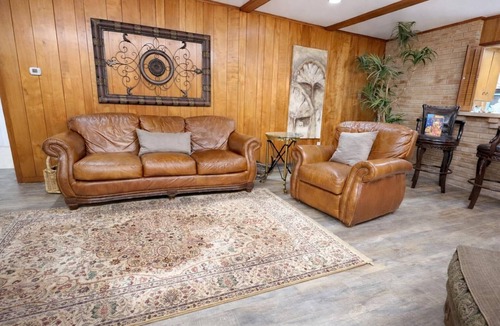 Hallettsville House | Spacious 3BR Home Near Downtown Hallettsville Enjoy warm Texas comfort just minutes from historic downtown Hallettsville. This 3BR/2.5BA single-story home offers 2,500+ sq ft, a full kitchen, covered porch, fenced yard, and multiple parking.