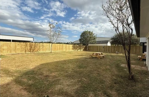 Magnolia House | Spacious 4-bedroom house in Magnolia, Visit our mini-cow, donkeys and goats!