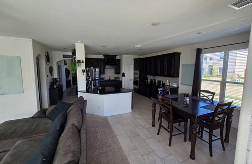 Argyle House | Spacious 4-bedroom Smart Home in Argyle with AC/Heat, small gym, and TVs galore