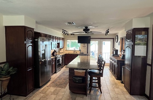 Azle House | Spacious 4-BR lake front WiFi ,hot tub, EV charger on Eagle Mountain Lake Azle
