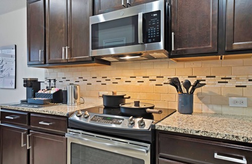 Cross Roads House | Spacious Backyard Fire Pit Near PGA Frisco, Universal Kids & Wedding Venues