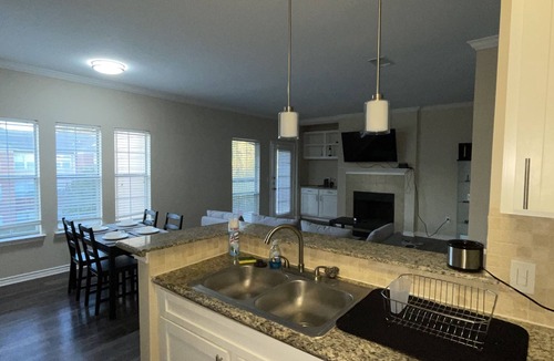 Barker Apartment | Spacious One Bedroom w Workspace and Patios