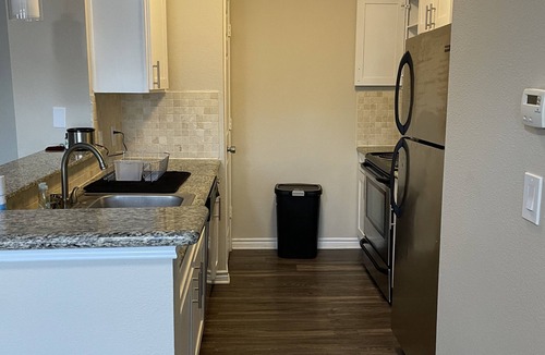 Barker Apartment | Spacious One Bedroom w Workspace and Patios