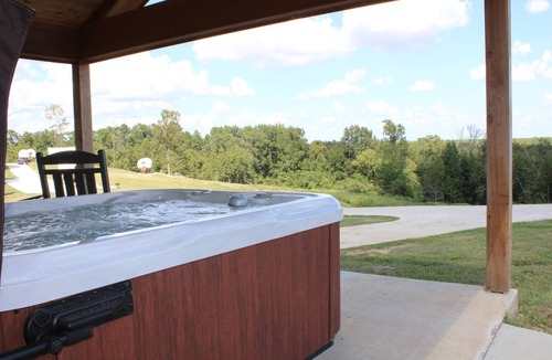 Shreveport Cabin | Stone Cabin with Hot Tub & Spectacular View at God's Country Resort