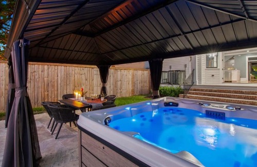 McDonough House | Stylish Modern Home with Hot Tub & Pergola