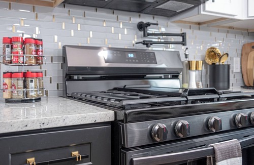 Eastside Promise Neighborhood House | Stylish Stay with Unforgettable Downtown Views!