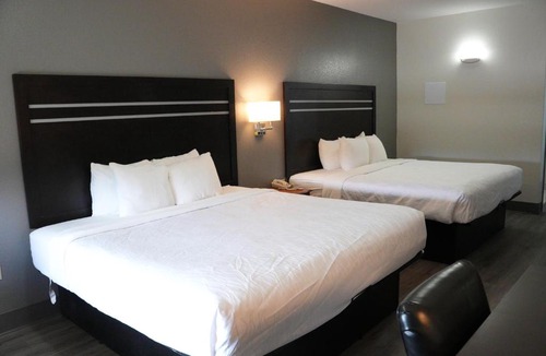 Pleasanton Hotel | Sunbridge Inn & Suite Extended Stay