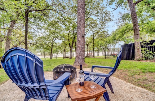 Flint House | The Blue Nest is a lakefront property with dock and access to Lake Palestine.