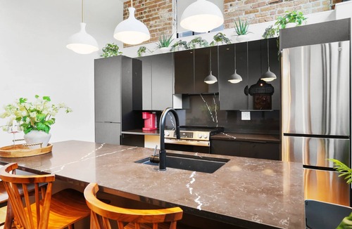 Faubourg Lafayette Hotel | The Gisele: 4BR/3BA for 8 | Pool + Streetcar Stop
