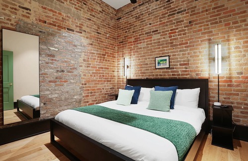 Faubourg Lafayette Hotel | The Gisele: 4BR/3BA for 8 | Pool + Streetcar Stop