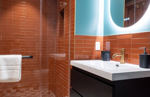 Faubourg Lafayette Hotel | The Gisele: 4BR/4BA for 8 | Pool + Streetcar Stop