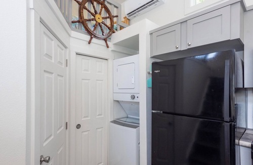 Rockport Cottage | The Live Oak Tiny House with fence
