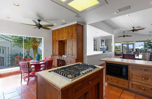 Key Allegro House | This 4/4 Villa with wrap around porch has amazing views and sits on a private canal!