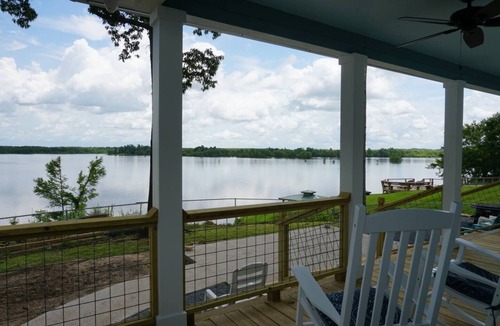 Negreet House | Toledo Queen Lakefront Custom 4 BR Home, Boathouse, Boat Ramp & Beautiful Views.