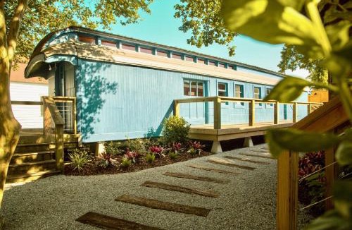 Grand Coteau Hotel | Train Wreck Inn - Boutique Train Car Stays - Self Check In