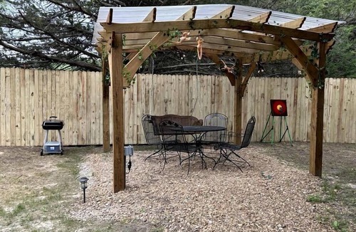Rosston House | Unique Jungle-Style Glamping RV with 8-Foot Suspended Tree Tent near Creek Trails in Forestburg, Texas