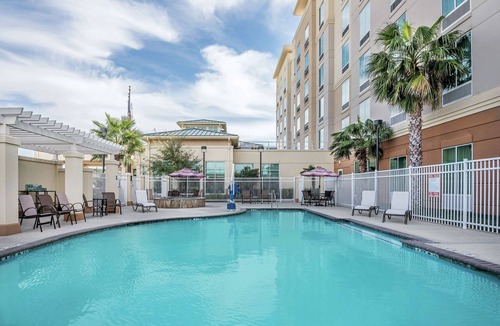 Far North Central Hotel | Unwind and Recharge in a Serene Space Near The Shops of La Cantera - 1.9 miles