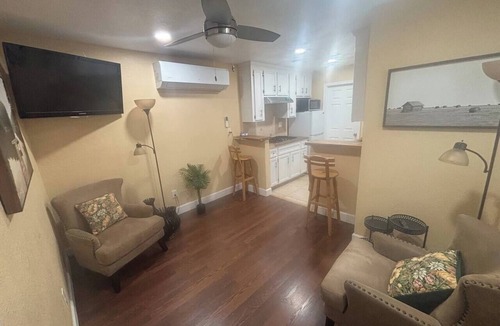 Greater East End Apartment | Urban comfort with a playful touch.