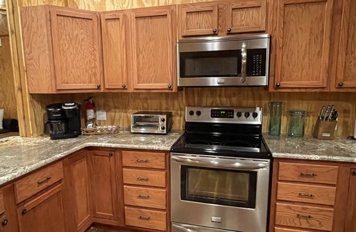 Karnack Cabin | Waterfront log cabin! 3 bed, 2 bath, 5 kayaks, sleeps 10. Boat dock, fire pit