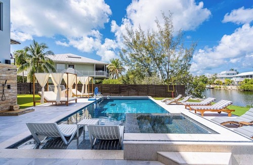 Buccaneer Point Villa | Waterfront Luxe Pool, Hot Tub, Theater, Gamesandmore