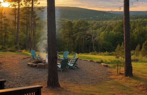 Antlers Cabin | Welcome to The Sanctuary, a peaceful mountain retreat designed for connection, comfort, and unforgettable views. From cozy fireplaces to expansive outdoor spaces overlooking White Rock Mountain.