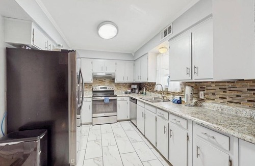 South Side House | Well-appointed home with a pool, children's items, fireplace, washer/dryer, & AC