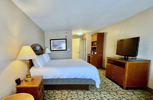 Chinatown Hotel | Westchase Escape with Breakfast, Outdoor Pool, and Quick Drive to CityCentre