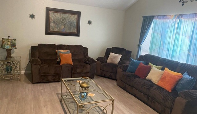 3-bedroom house in tranquil Missouri City with 2 rollaways and one twin ottoman.