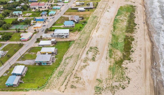 A Beach Sanctuary: Spacious 3BR beachfront home in Grand Isle, LA, perfect for 12 guests.