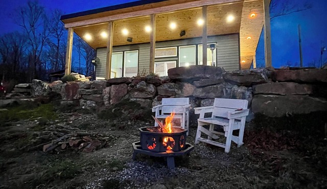 Beautiful modern cabin on top of the mountain with stunning sunset views.
